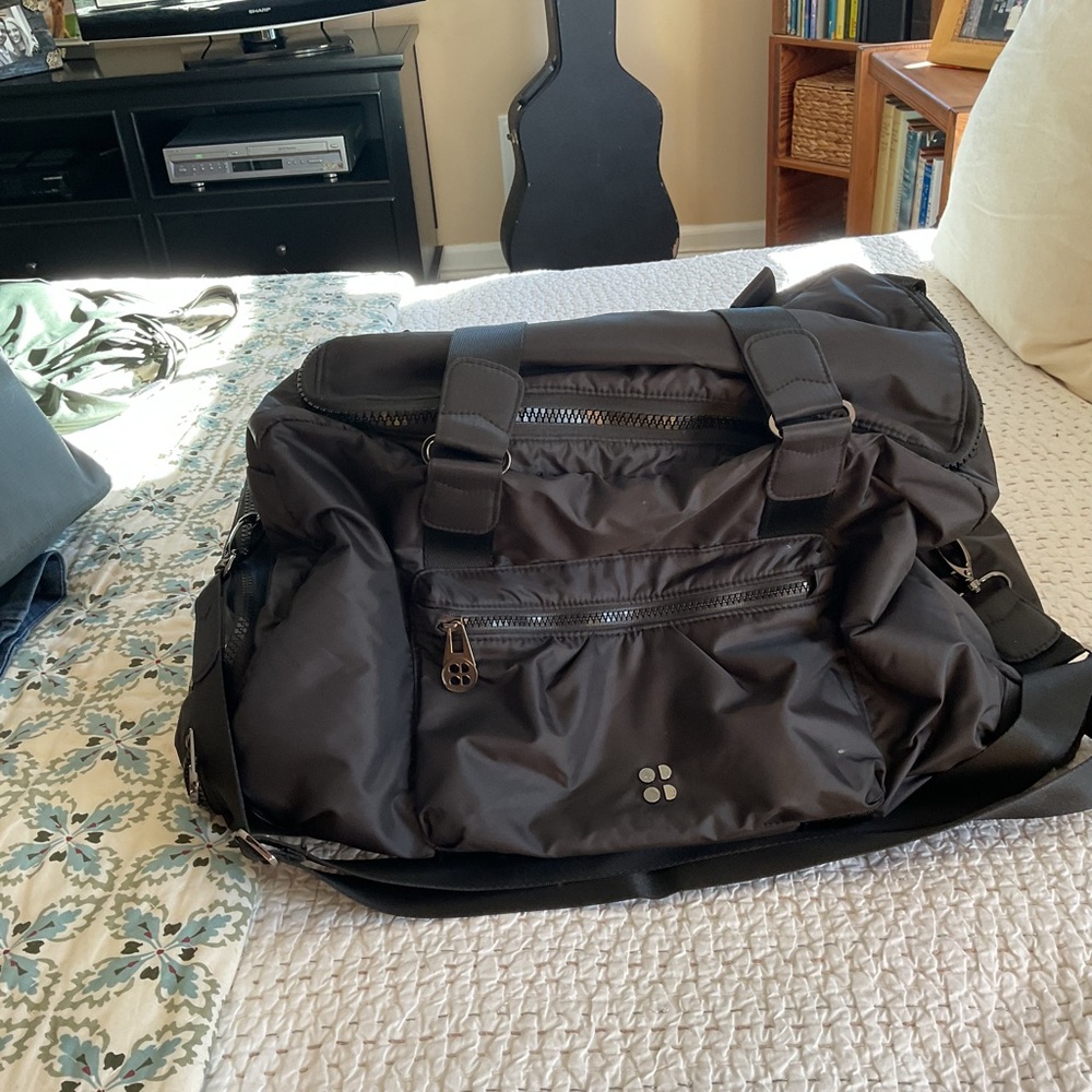 Sweaty Betty gym bag with wet swim suit compartment